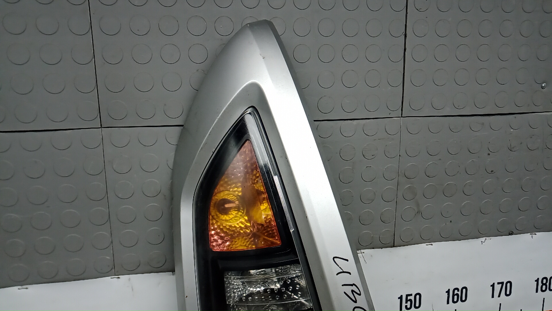 Фонарь задний левый