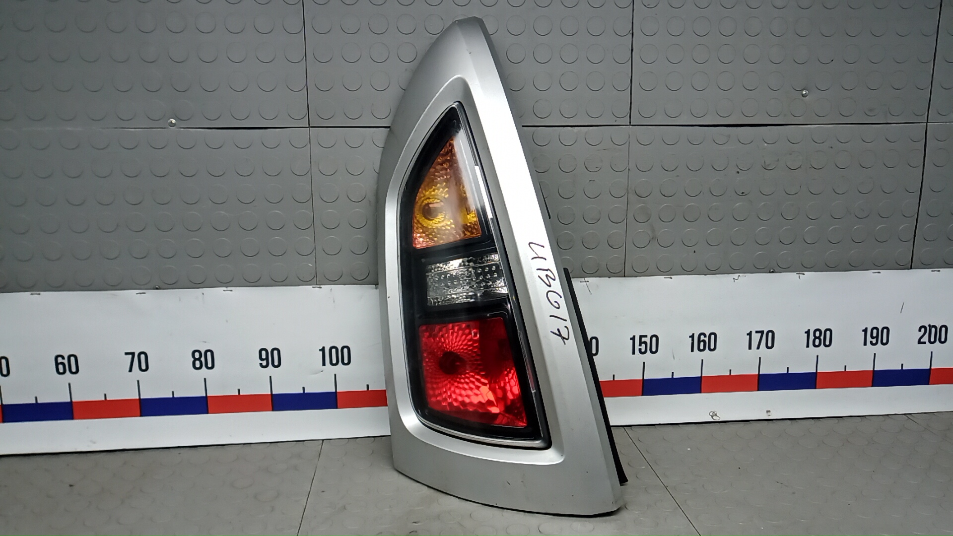 Фонарь задний левый