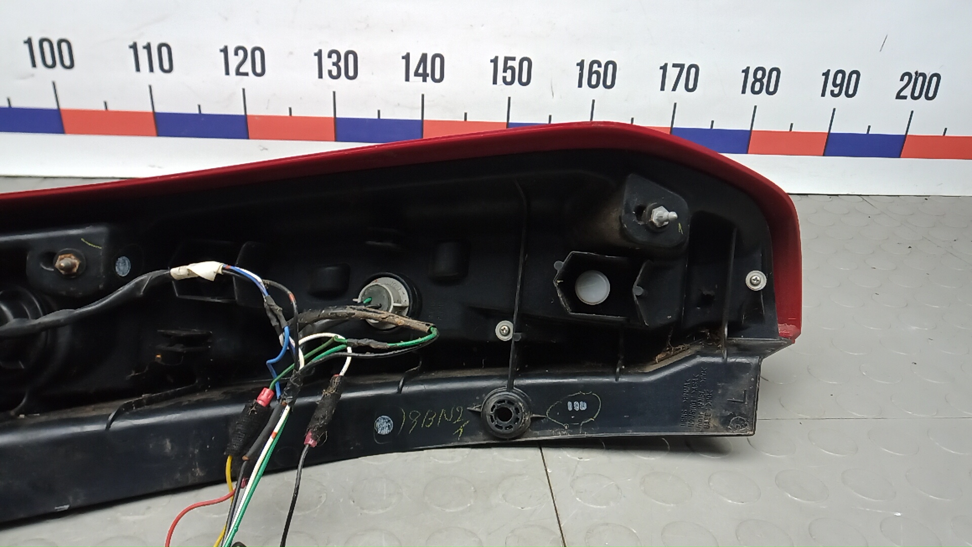 Фонарь задний левый