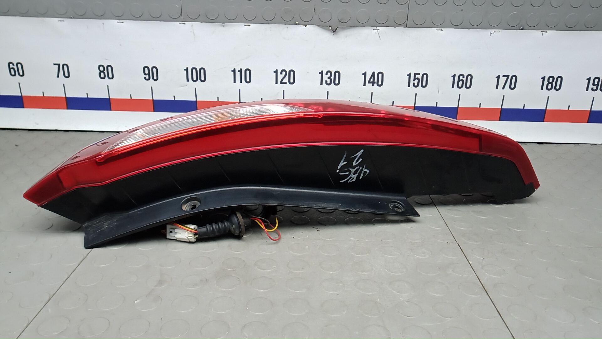 Фонарь задний левый