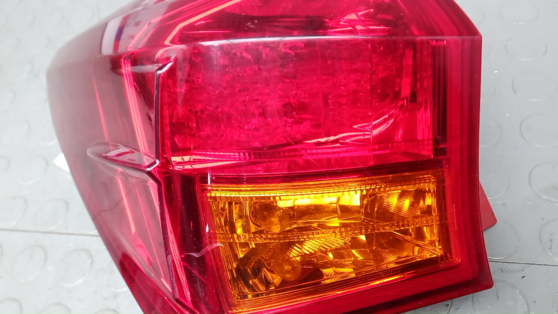 Фонарь задний левый