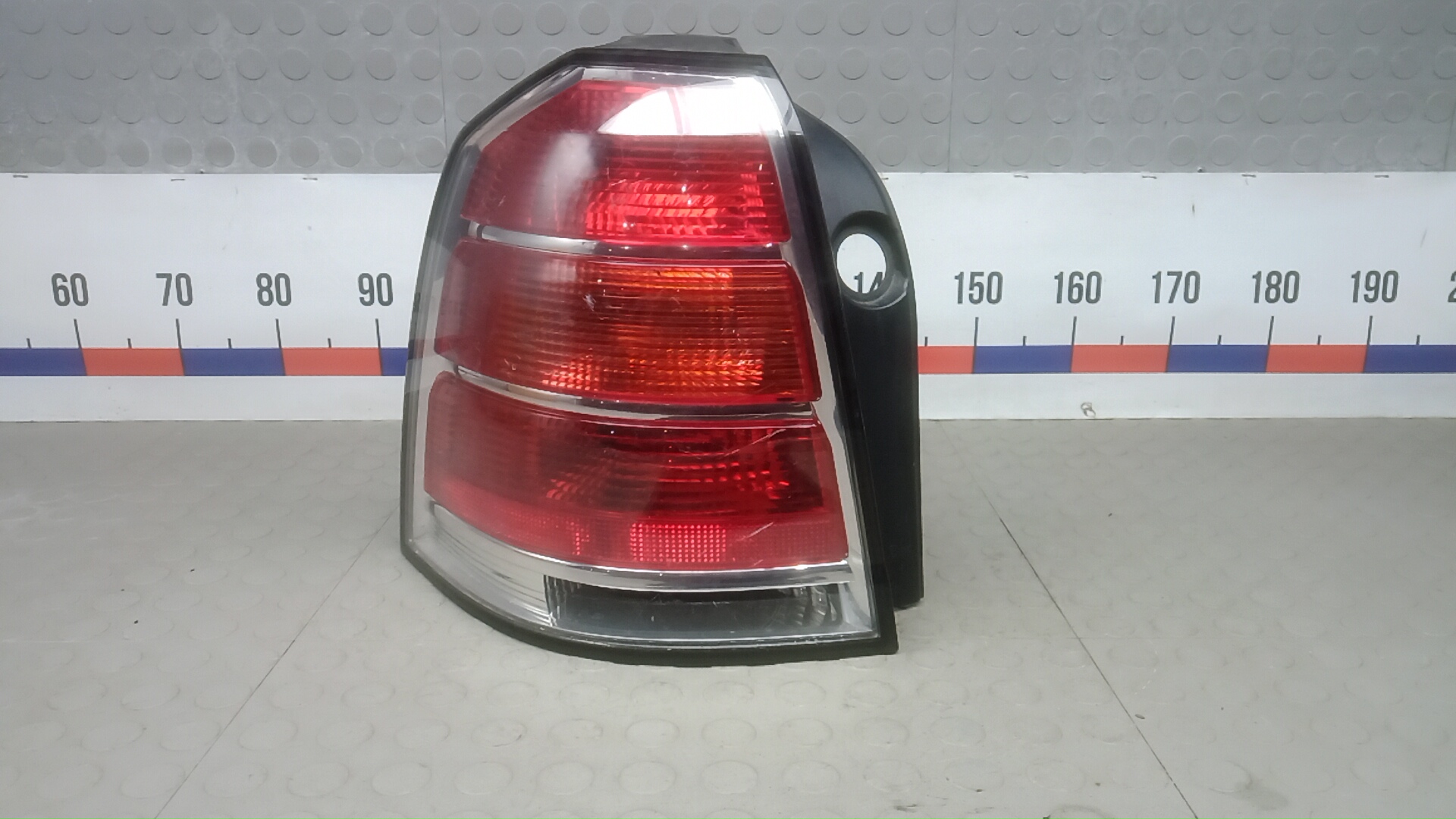 Фонарь задний левый