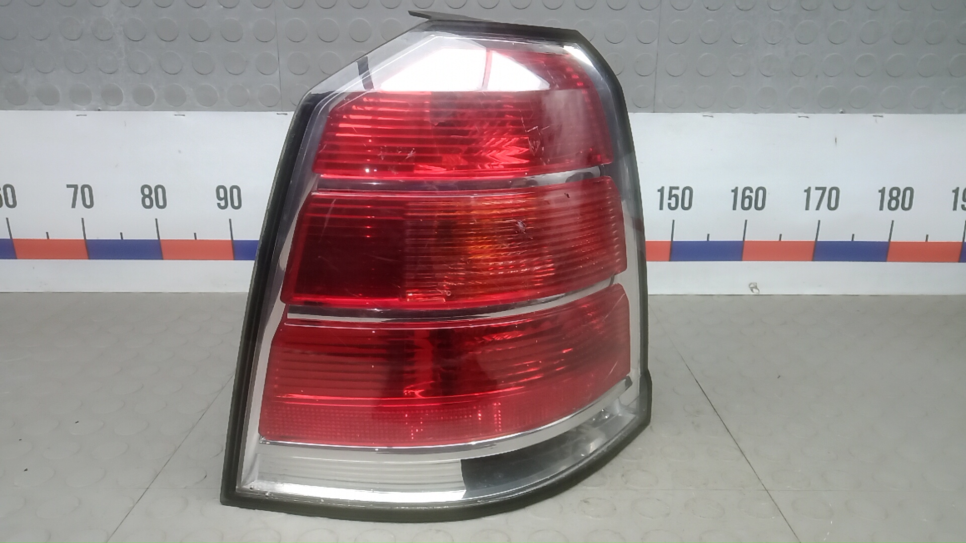 Фонарь задний левый