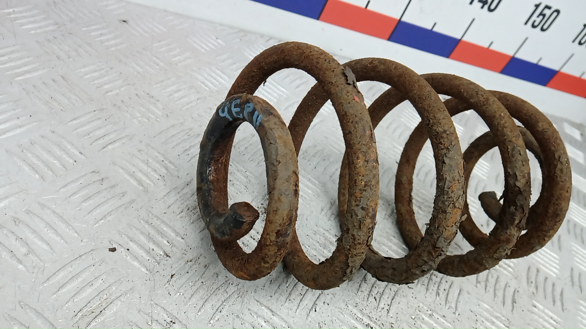 Пружина задняя