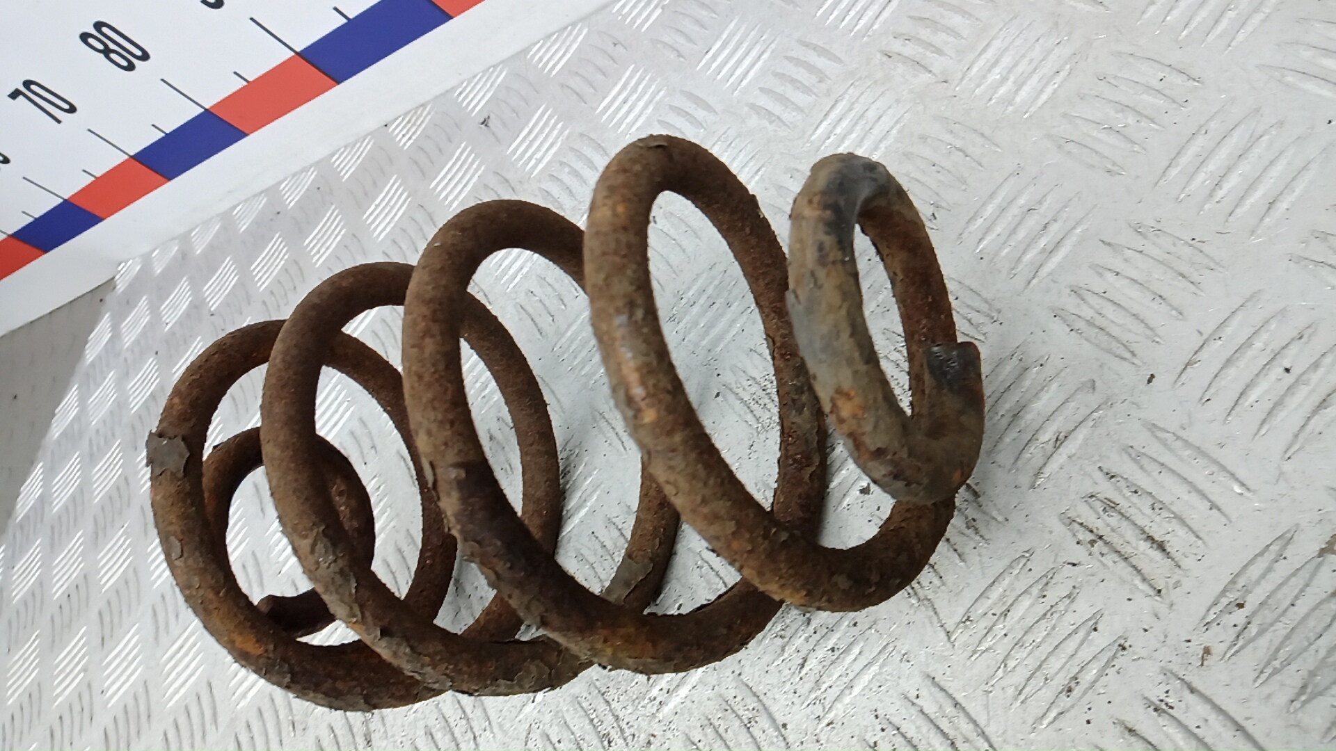 Пружина задняя