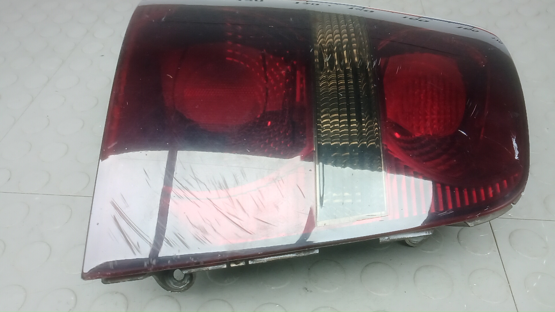 Фонарь задний левый