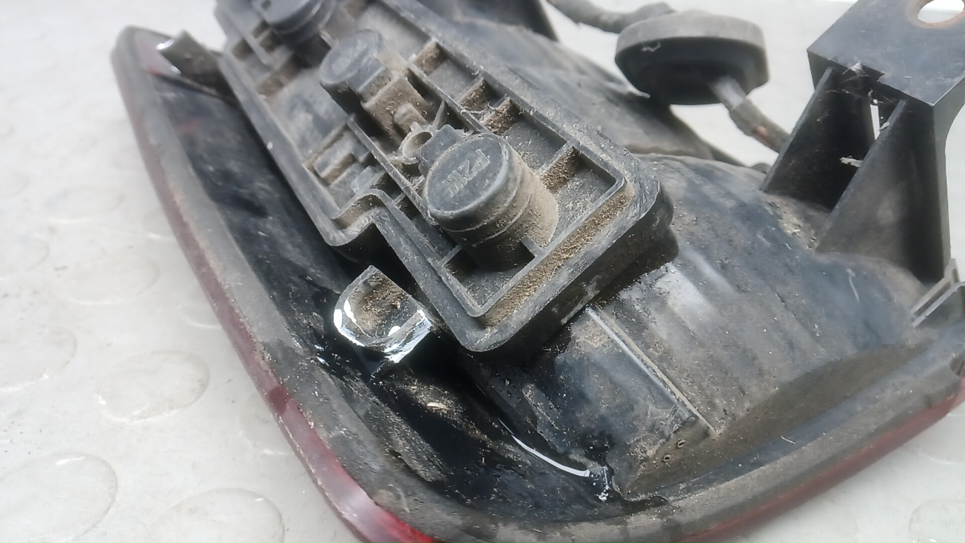 Фонарь задний левый