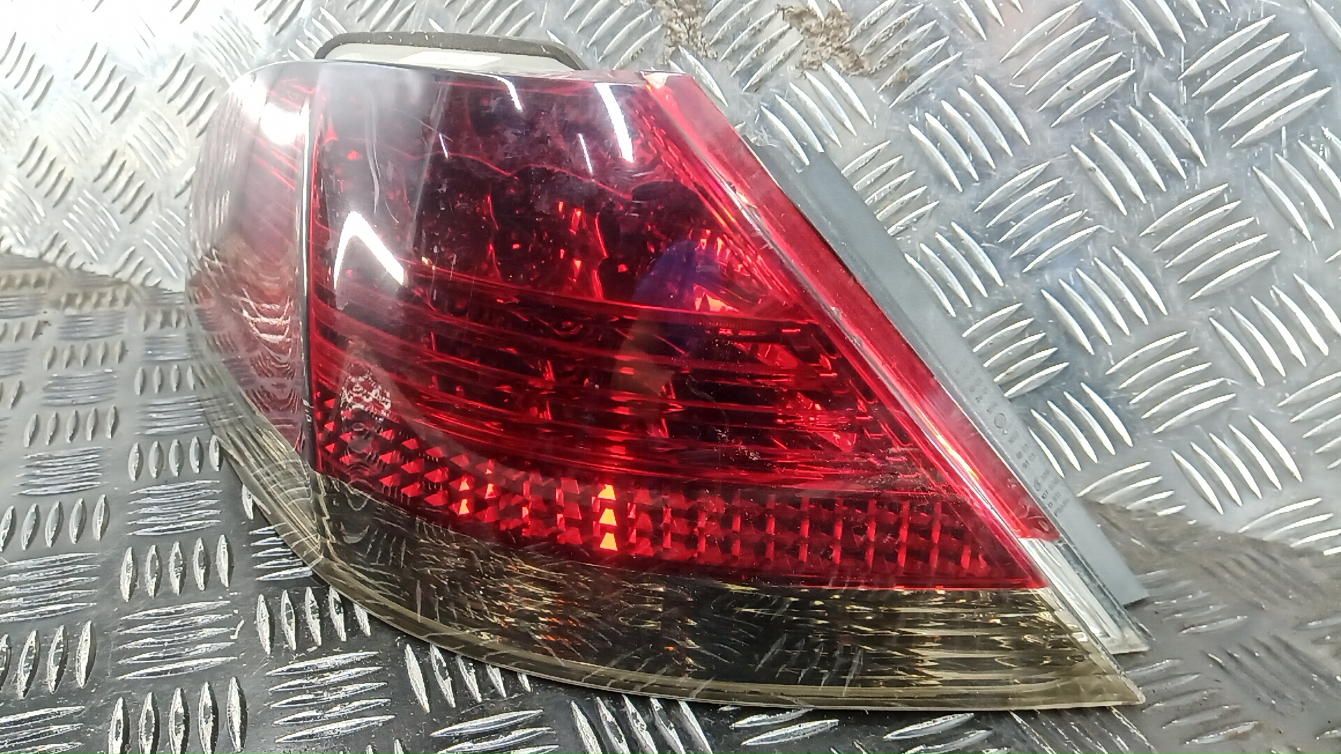 Фонарь задний левый