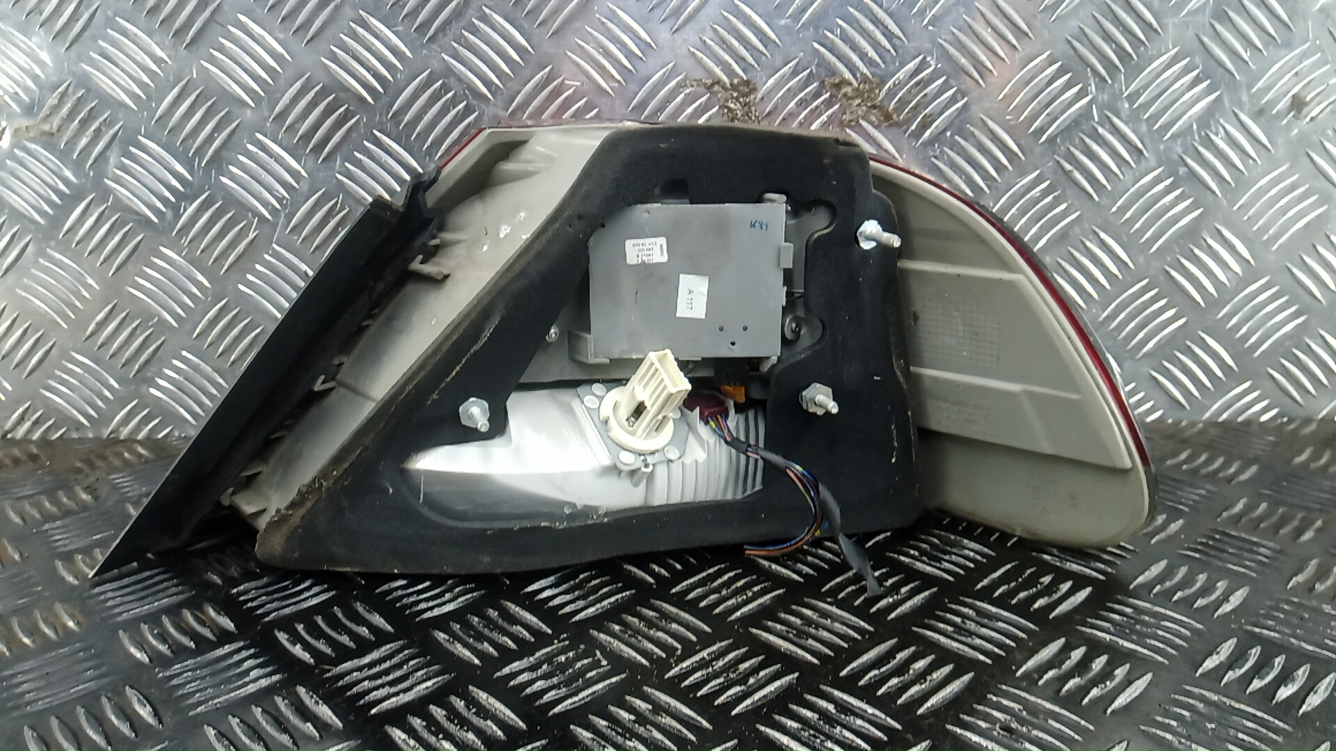 Фонарь задний левый