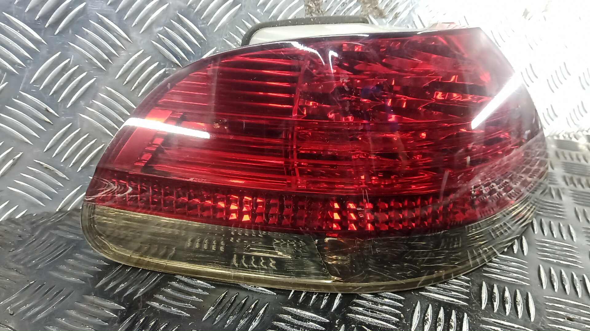 Фонарь задний левый