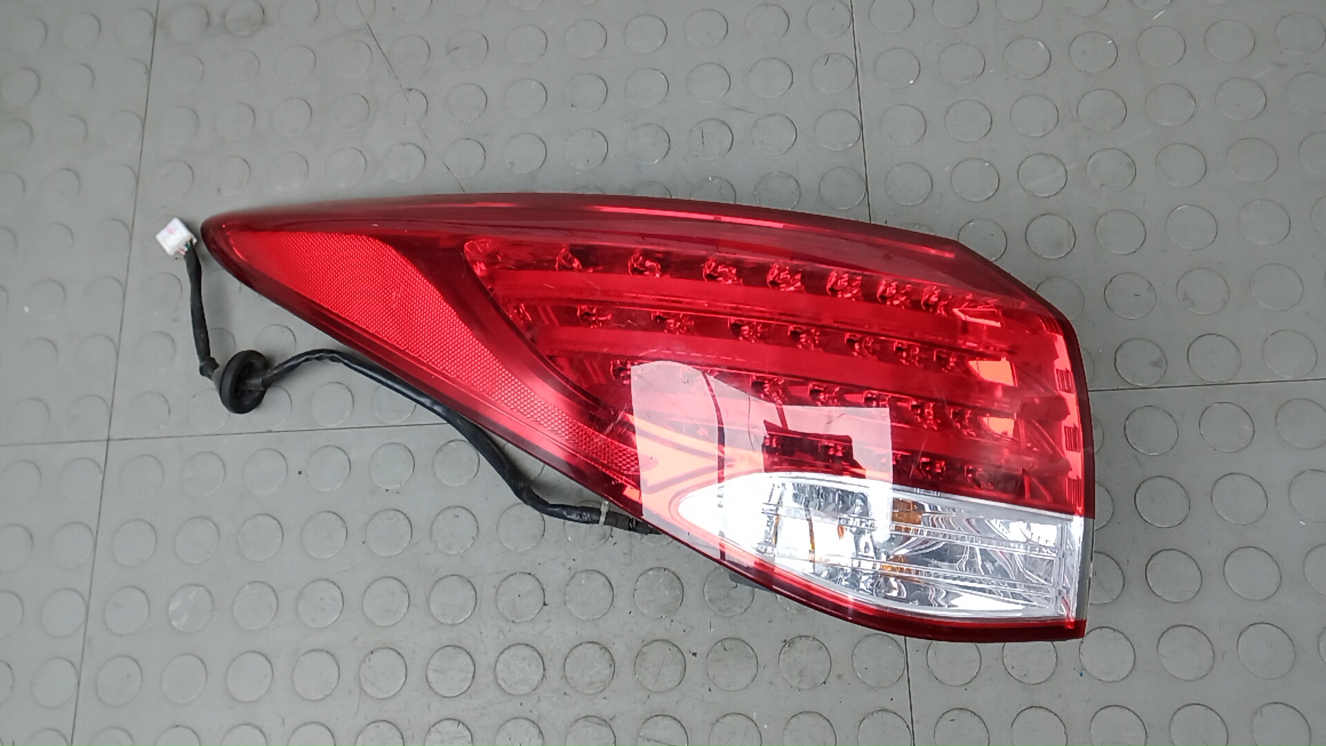 Фонарь задний левый