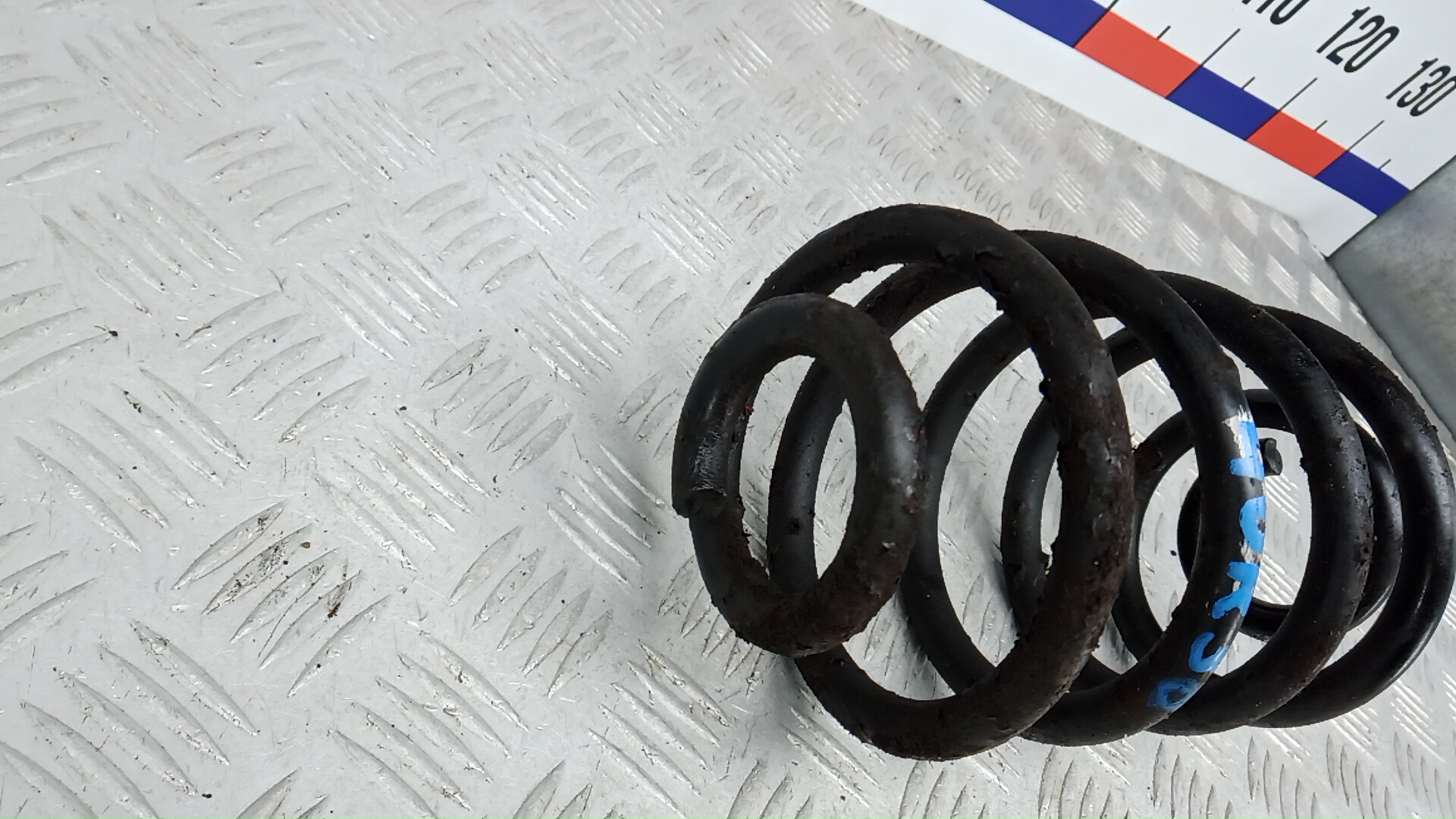 Пружина задняя