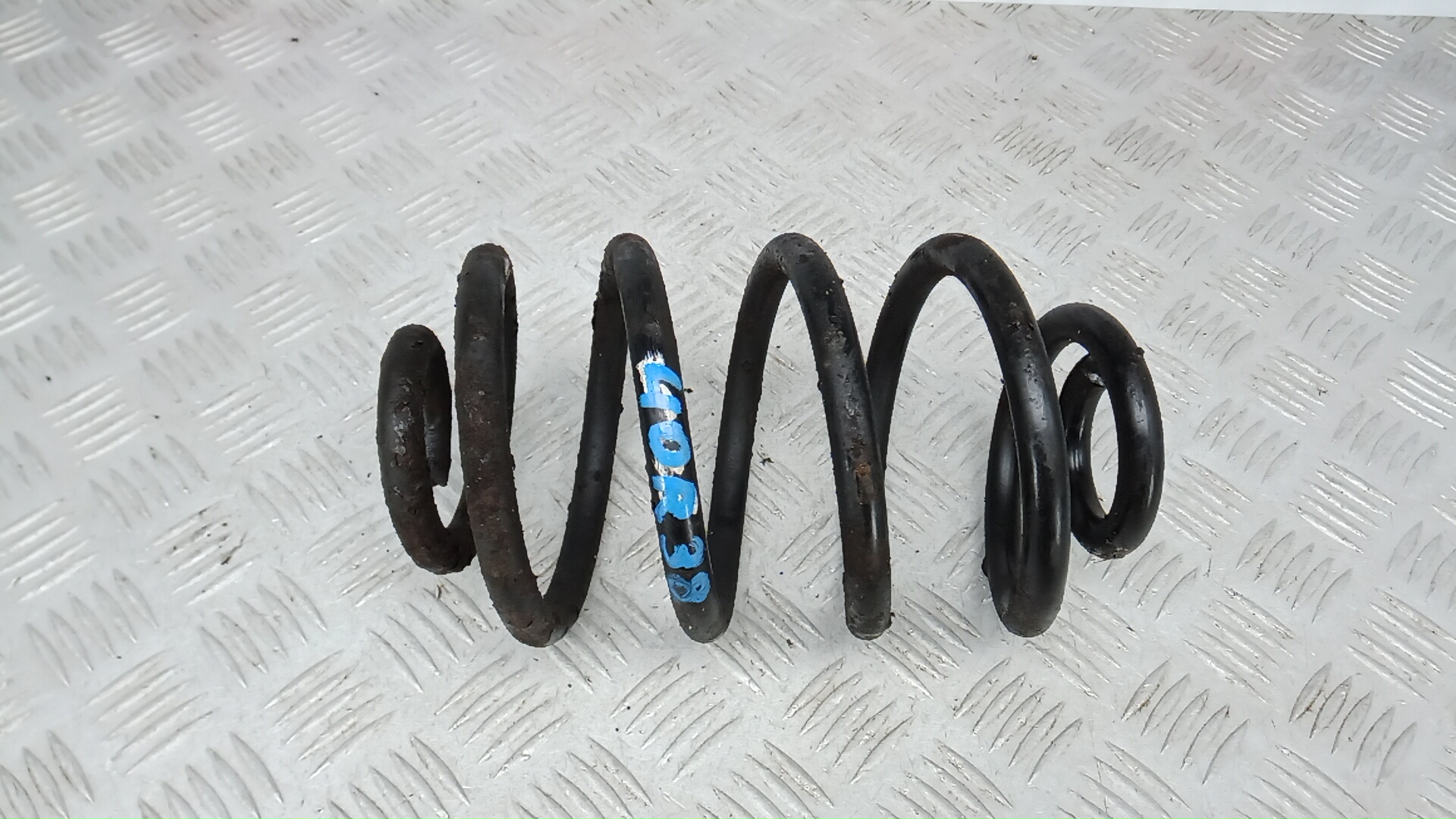 Пружина задняя