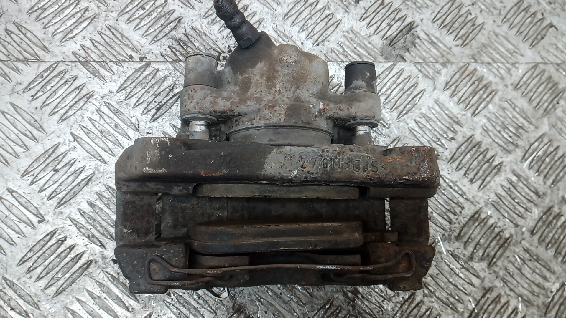 Суппорт передний левый