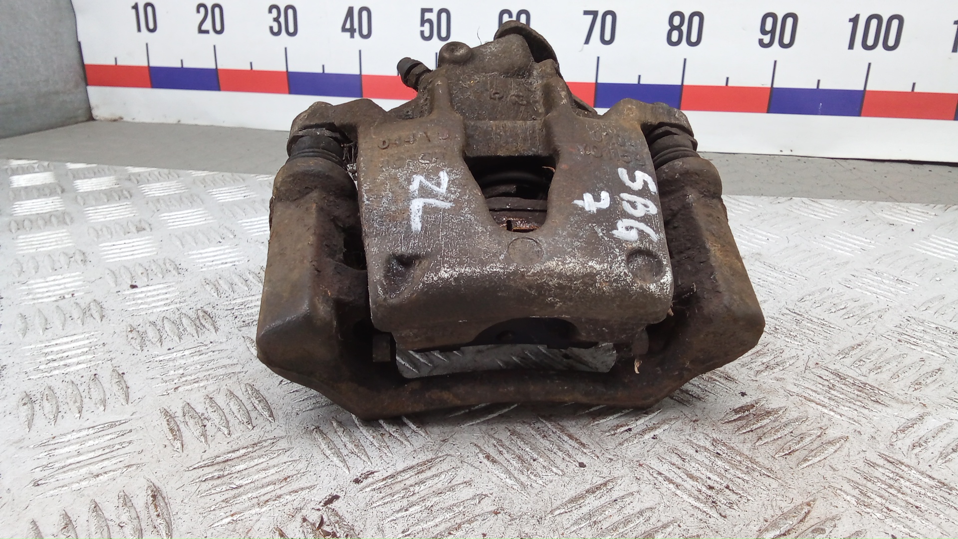 Суппорт задний левый