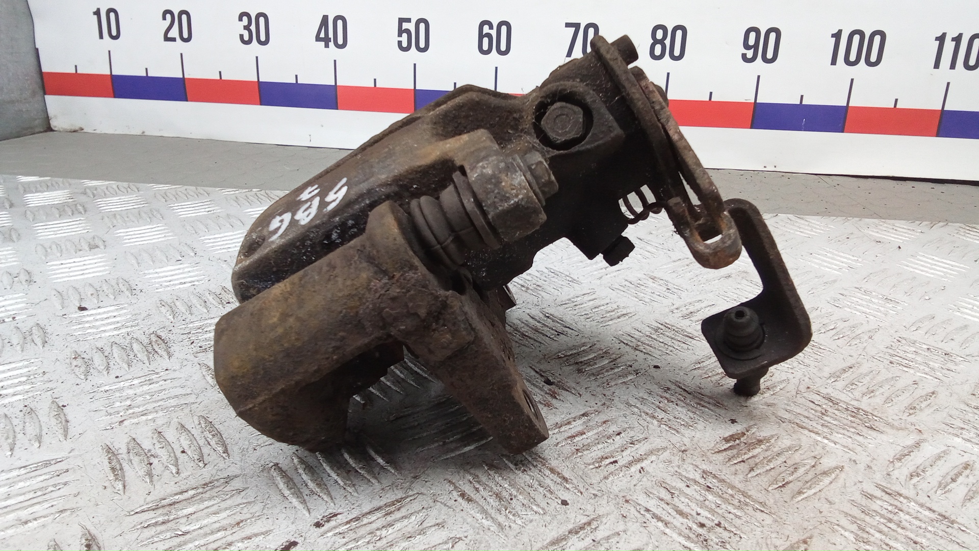 Суппорт задний левый