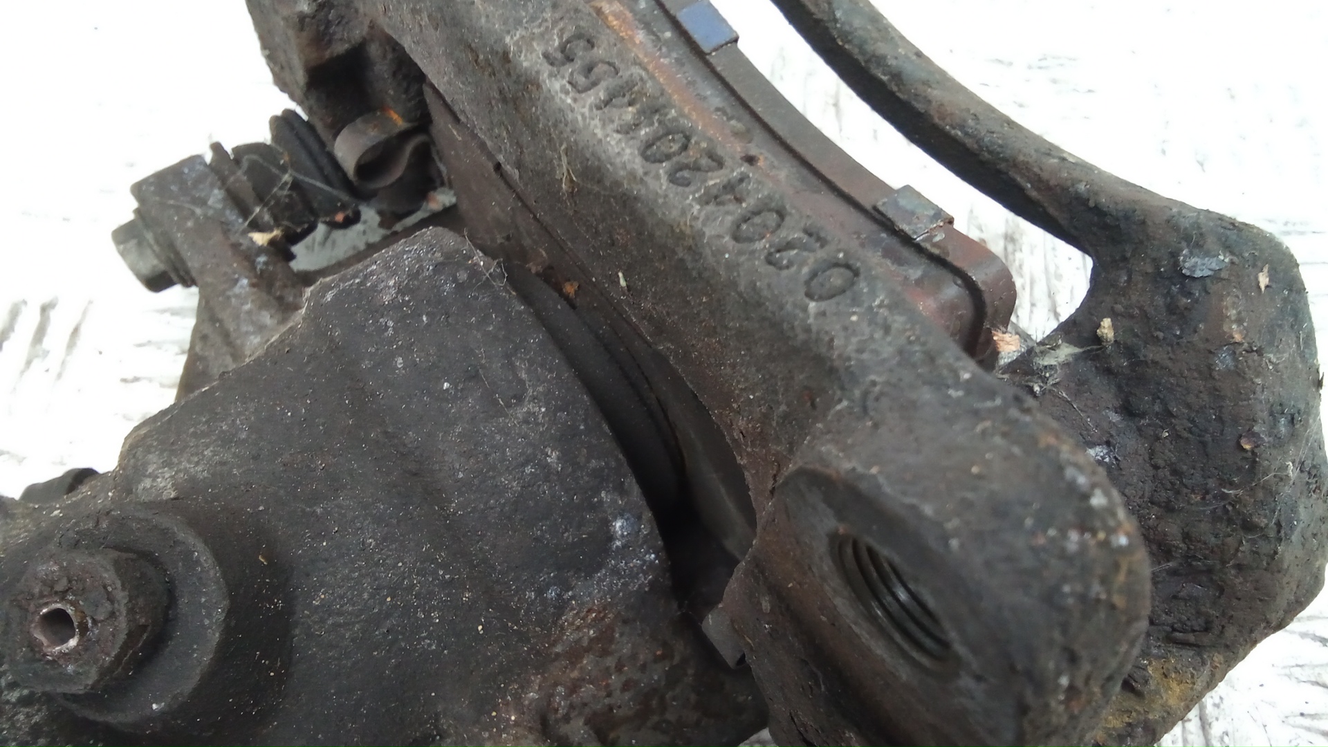 Суппорт задний левый