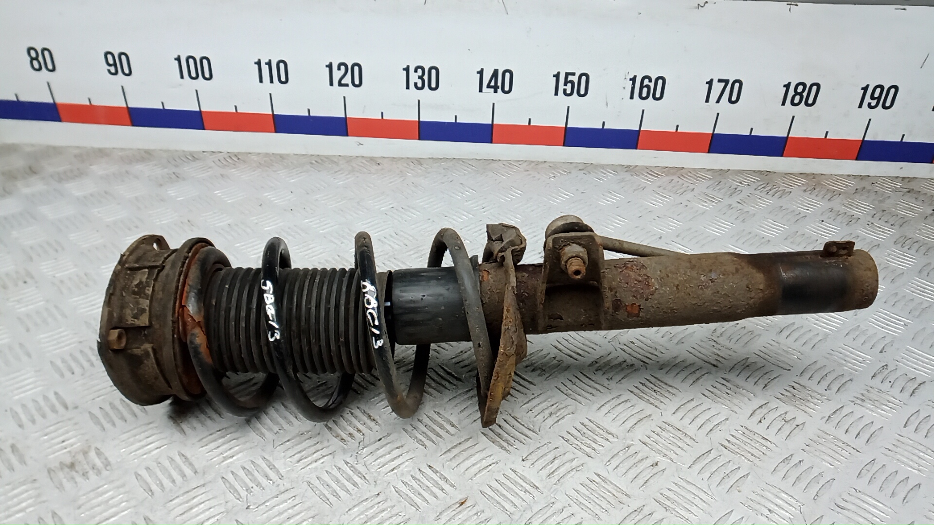 Амортизатор передний левый