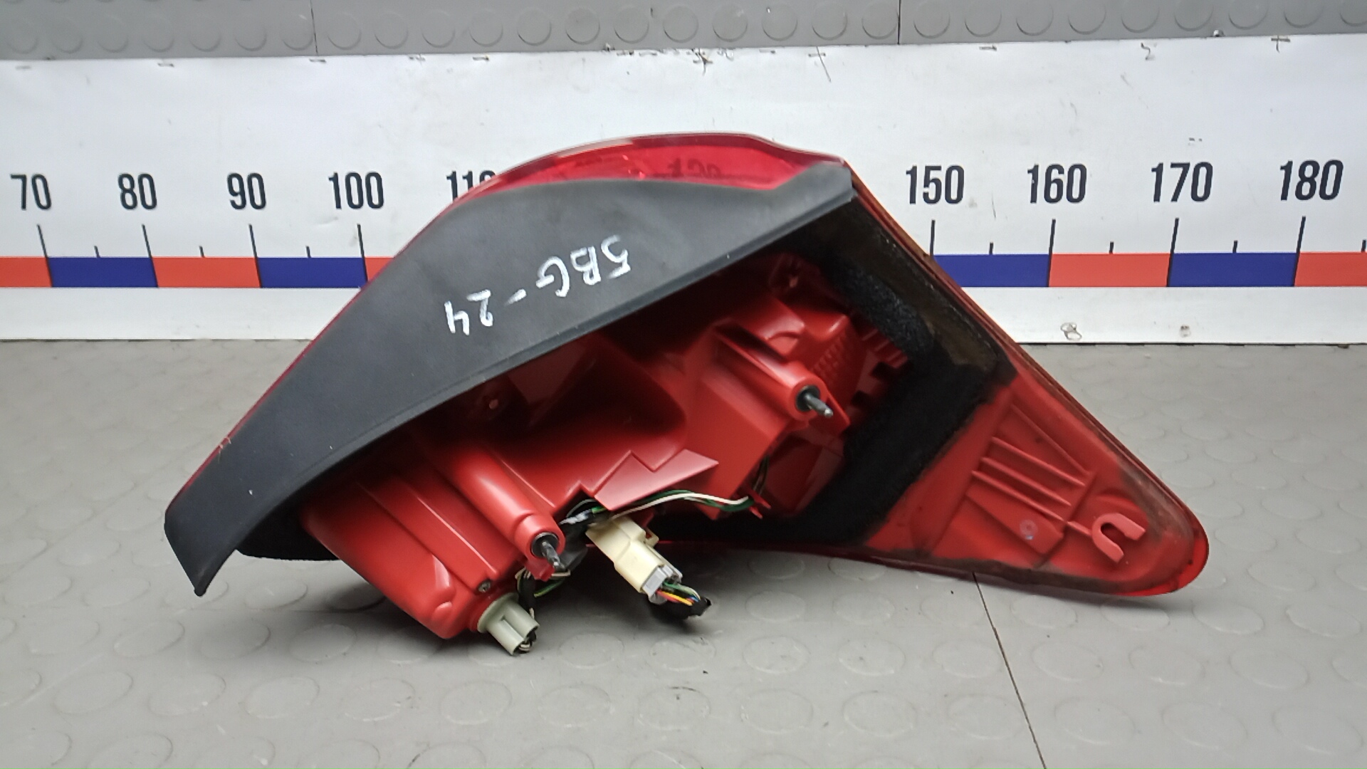 Фонарь задний левый