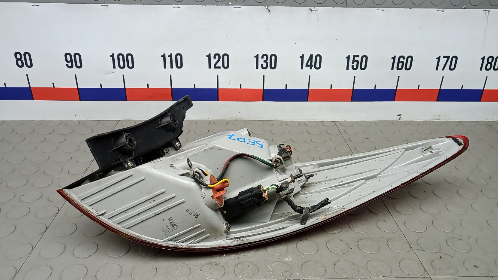 Фонарь задний левый