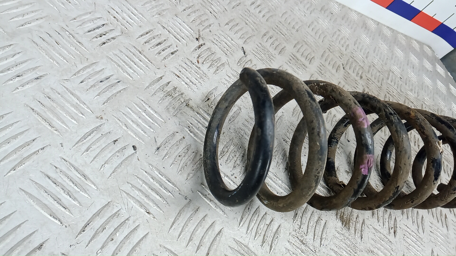 Пружина задняя