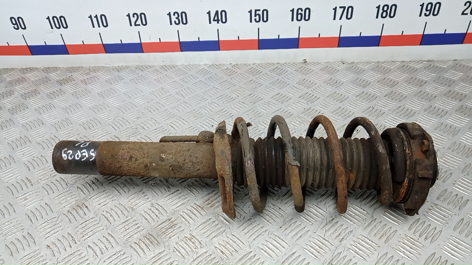 Амортизатор передний левый