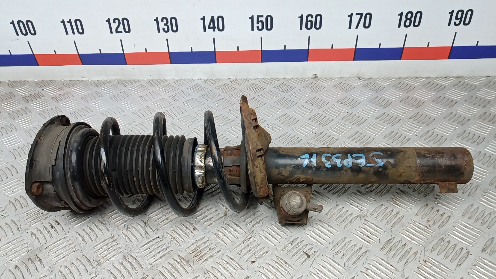 Амортизатор передний левый