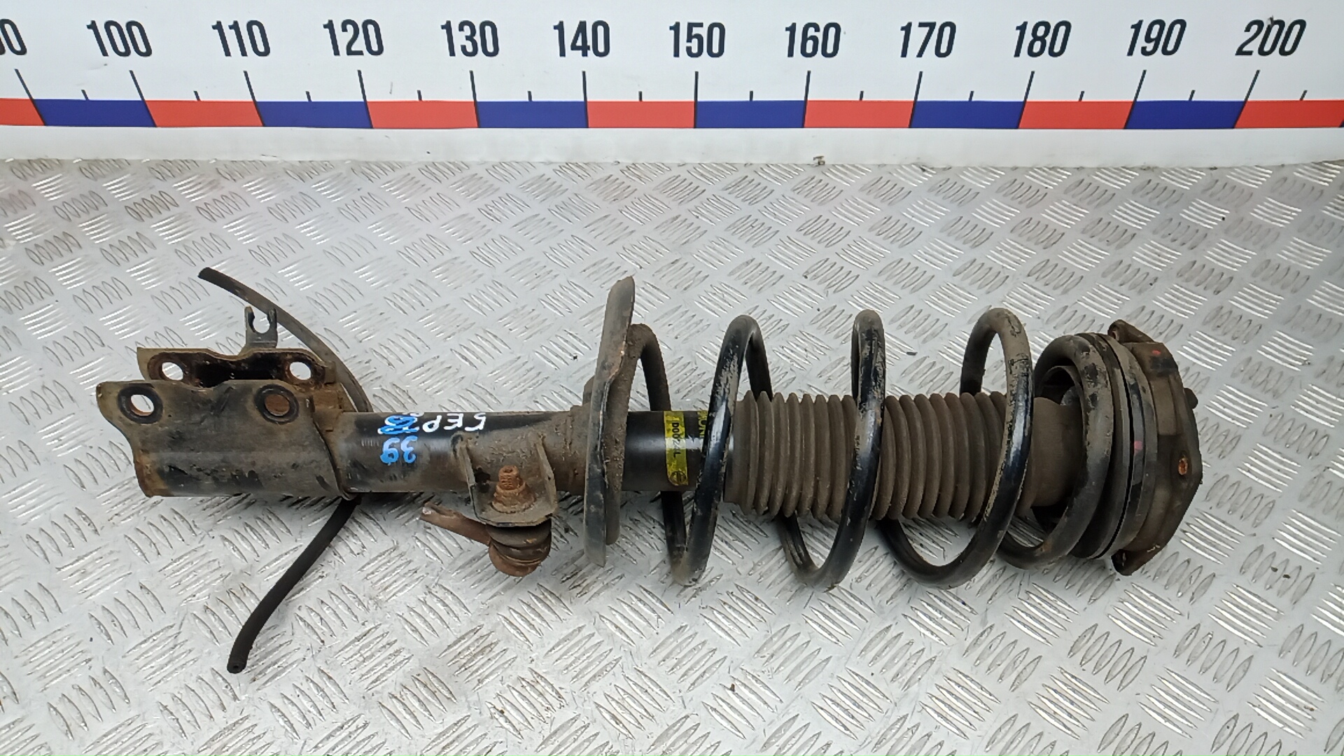 Амортизатор передний левый