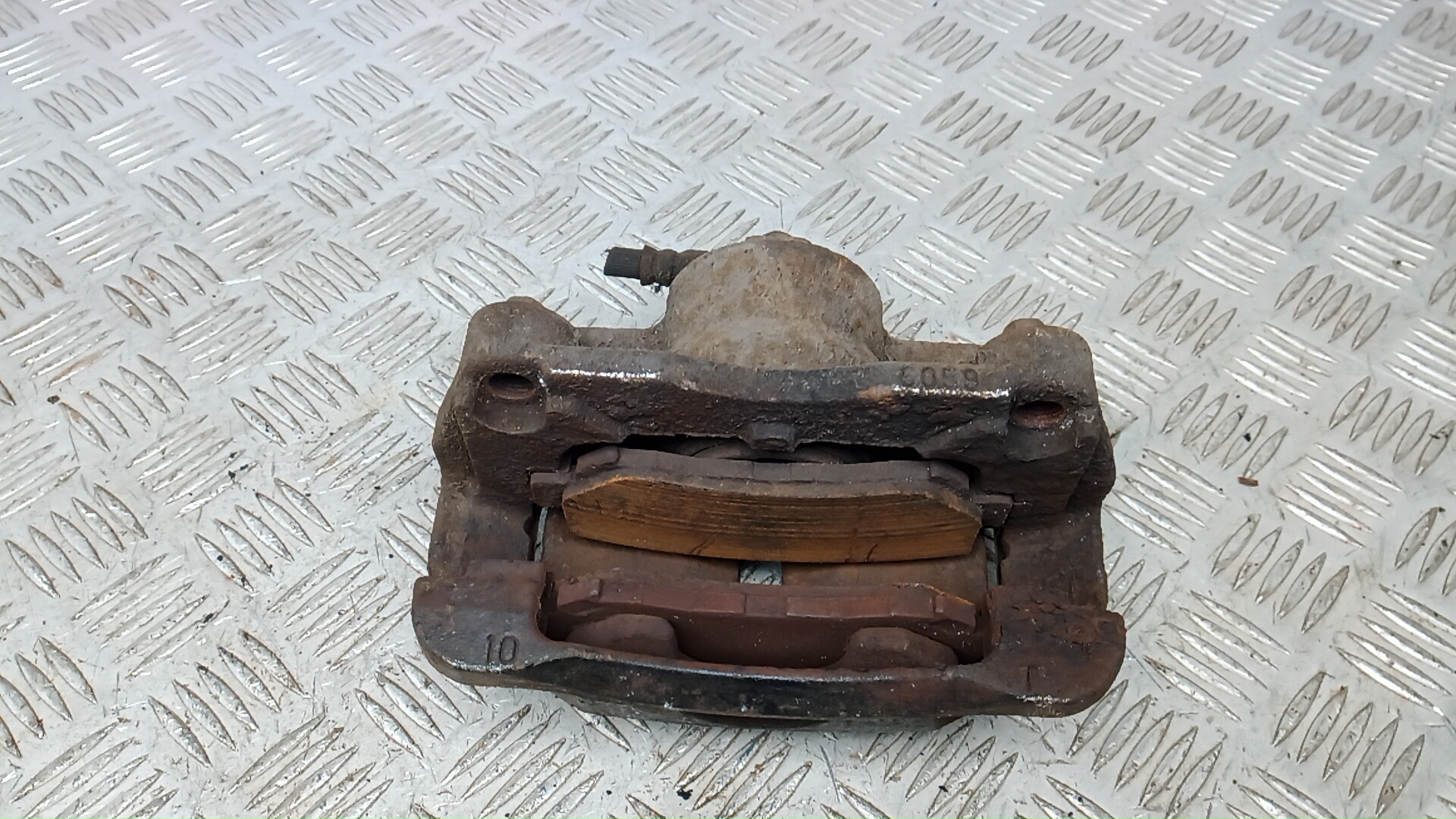 Суппорт передний левый