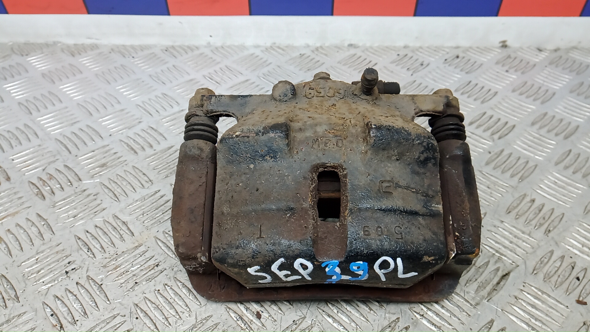 Суппорт передний левый