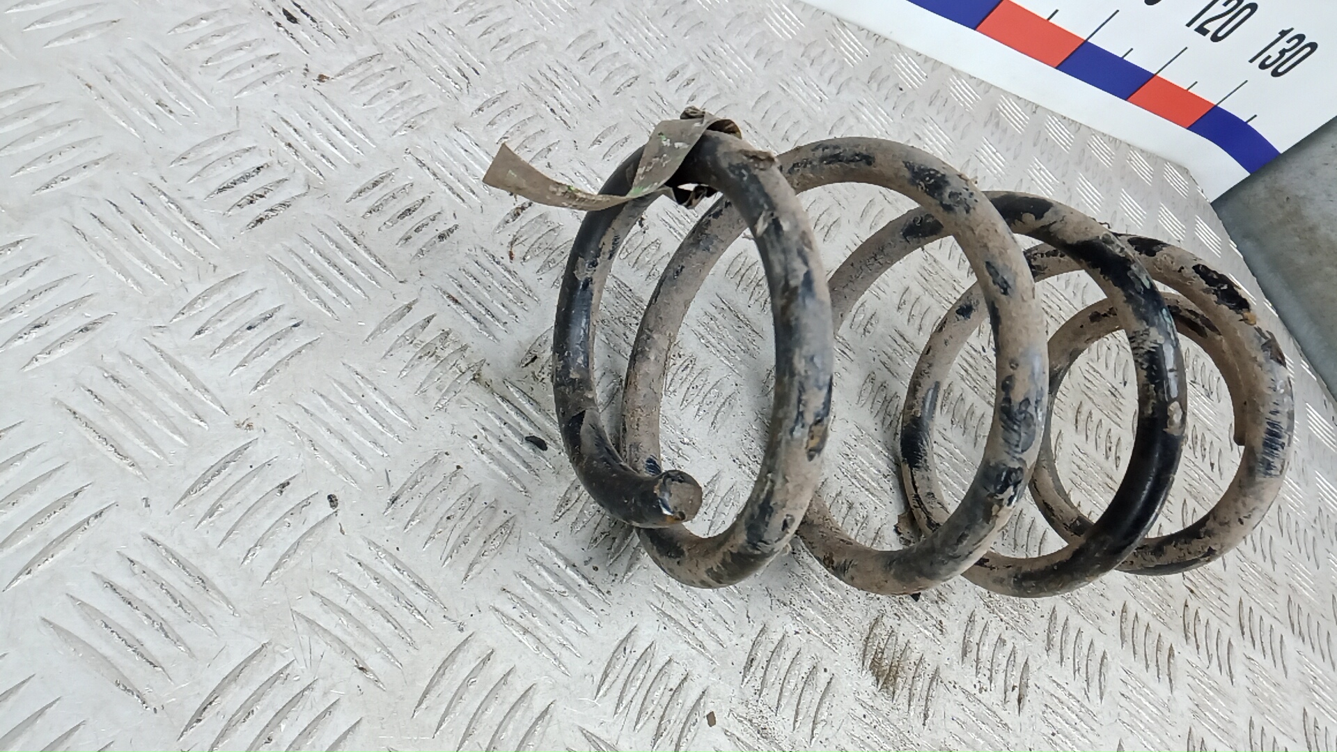 Пружина задняя