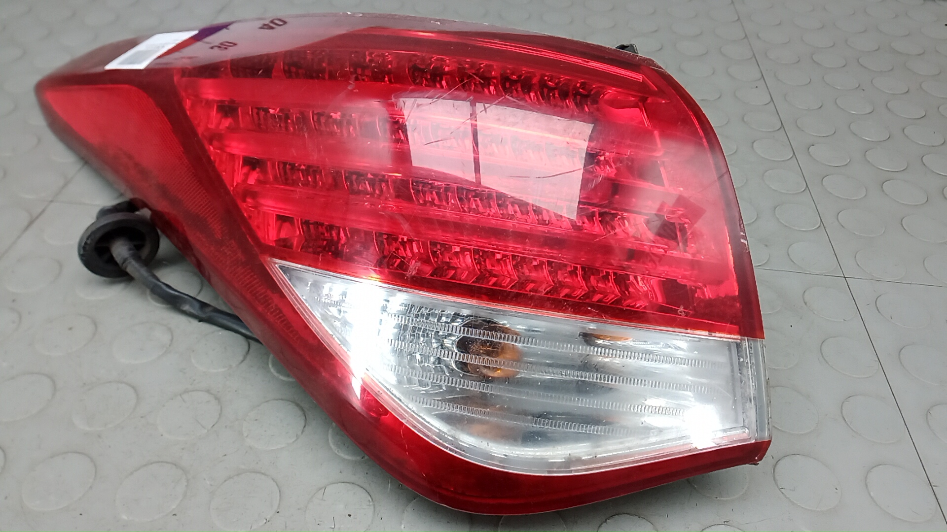 Фонарь задний левый