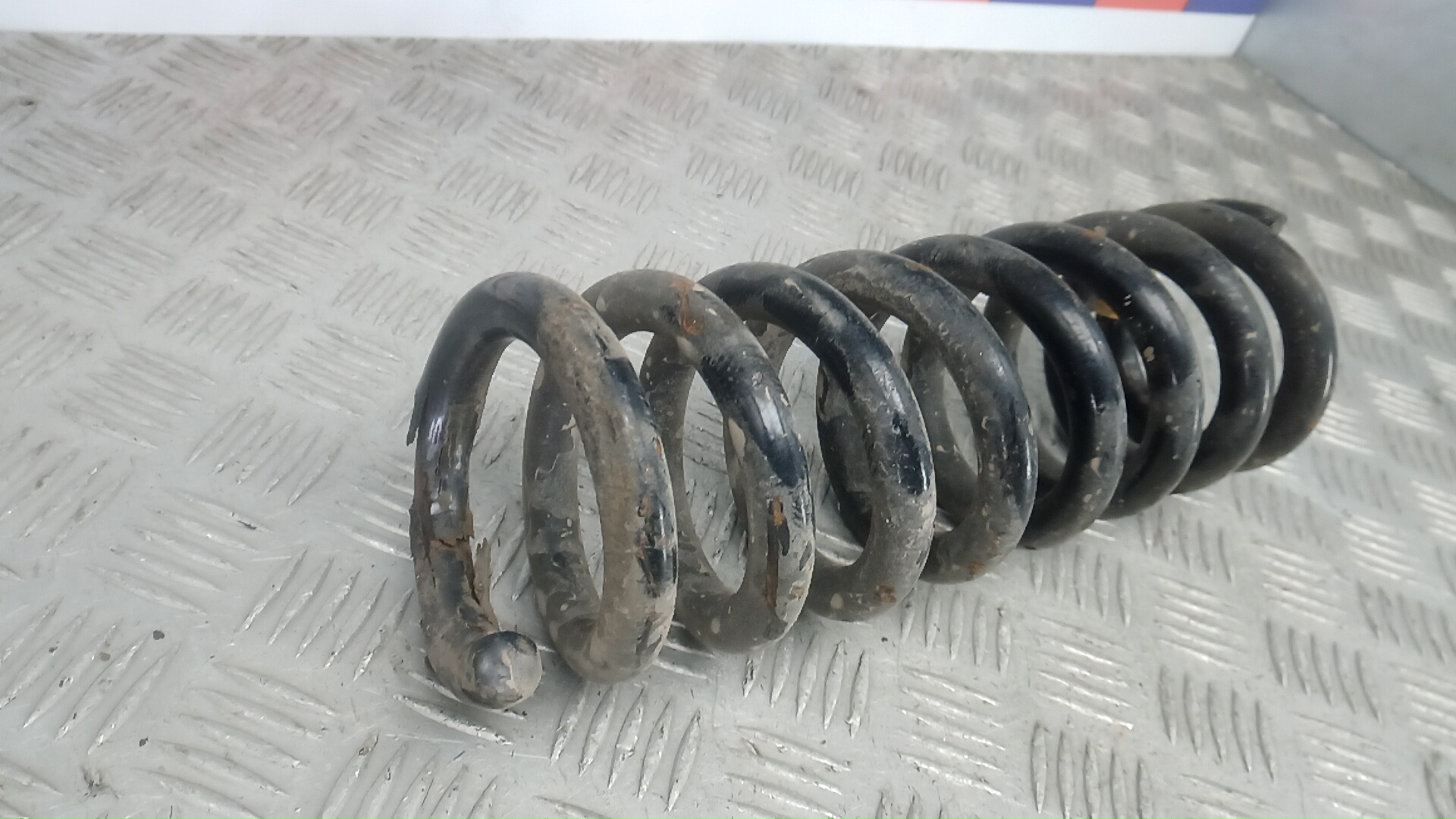 Пружина задняя