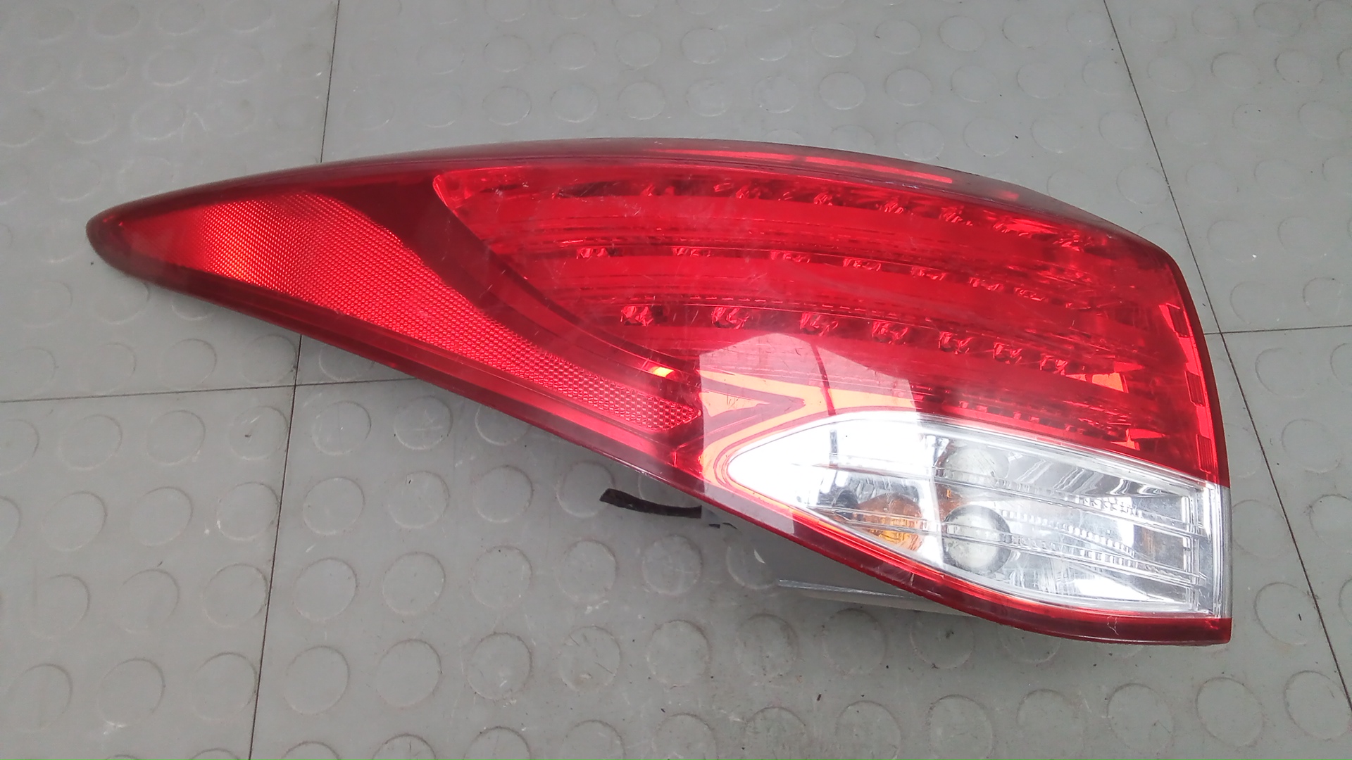 Фонарь задний левый