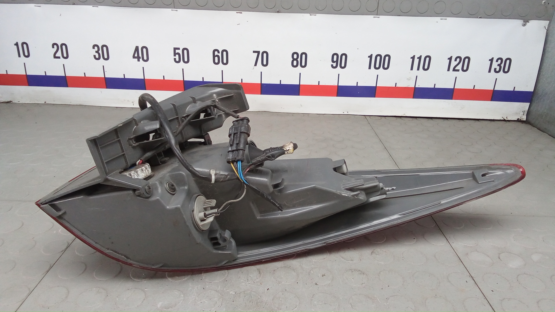 Фонарь задний левый