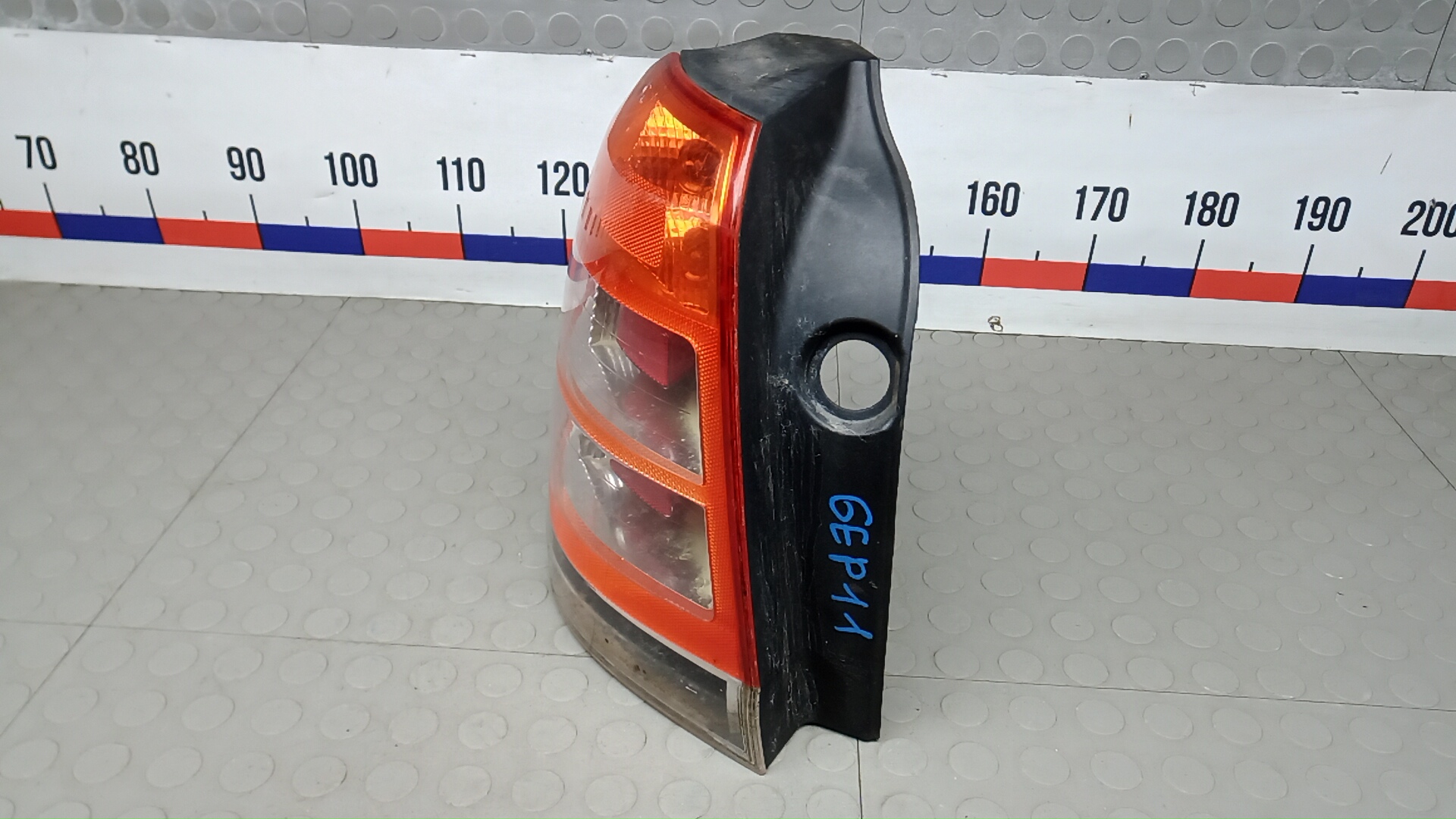 Фонарь задний левый