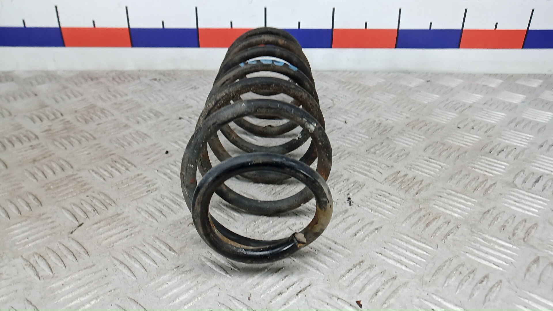 Пружина задняя