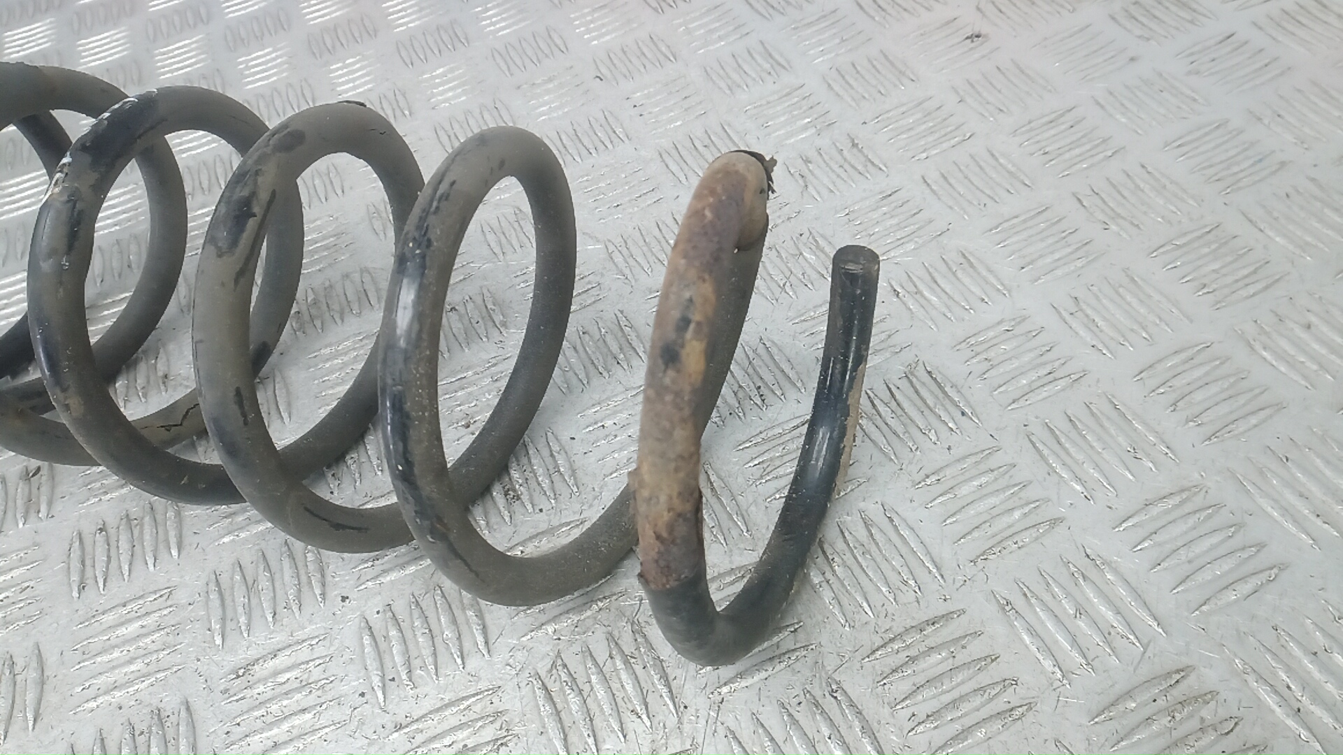 Пружина задняя