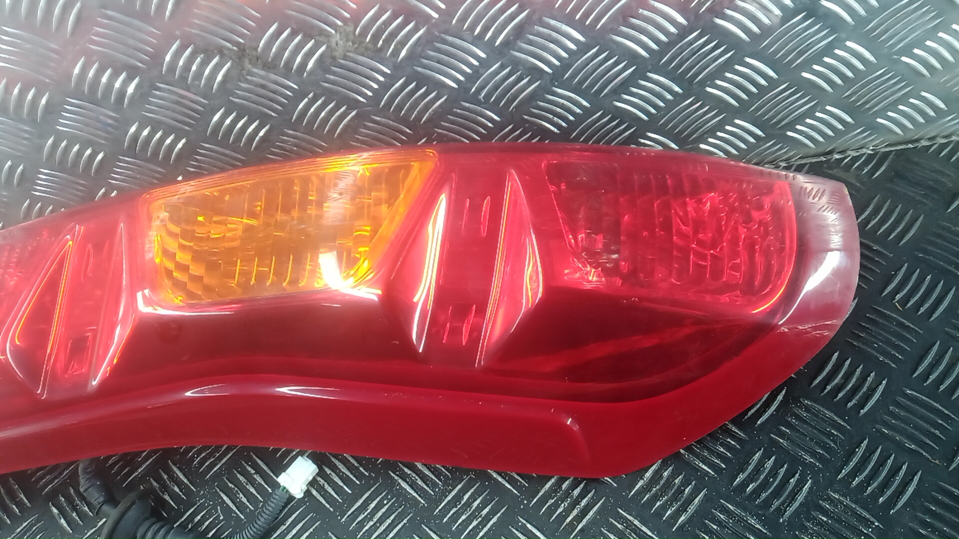 Фонарь задний левый