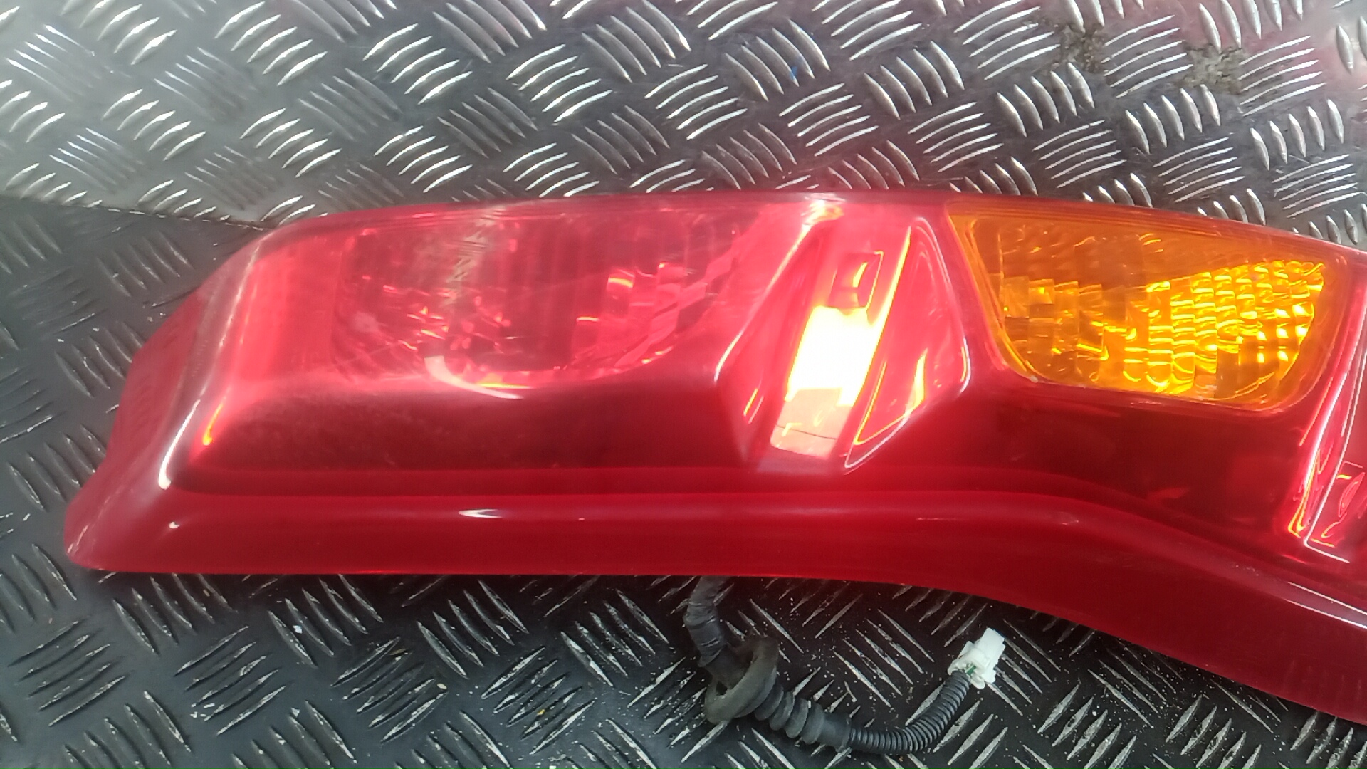 Фонарь задний левый