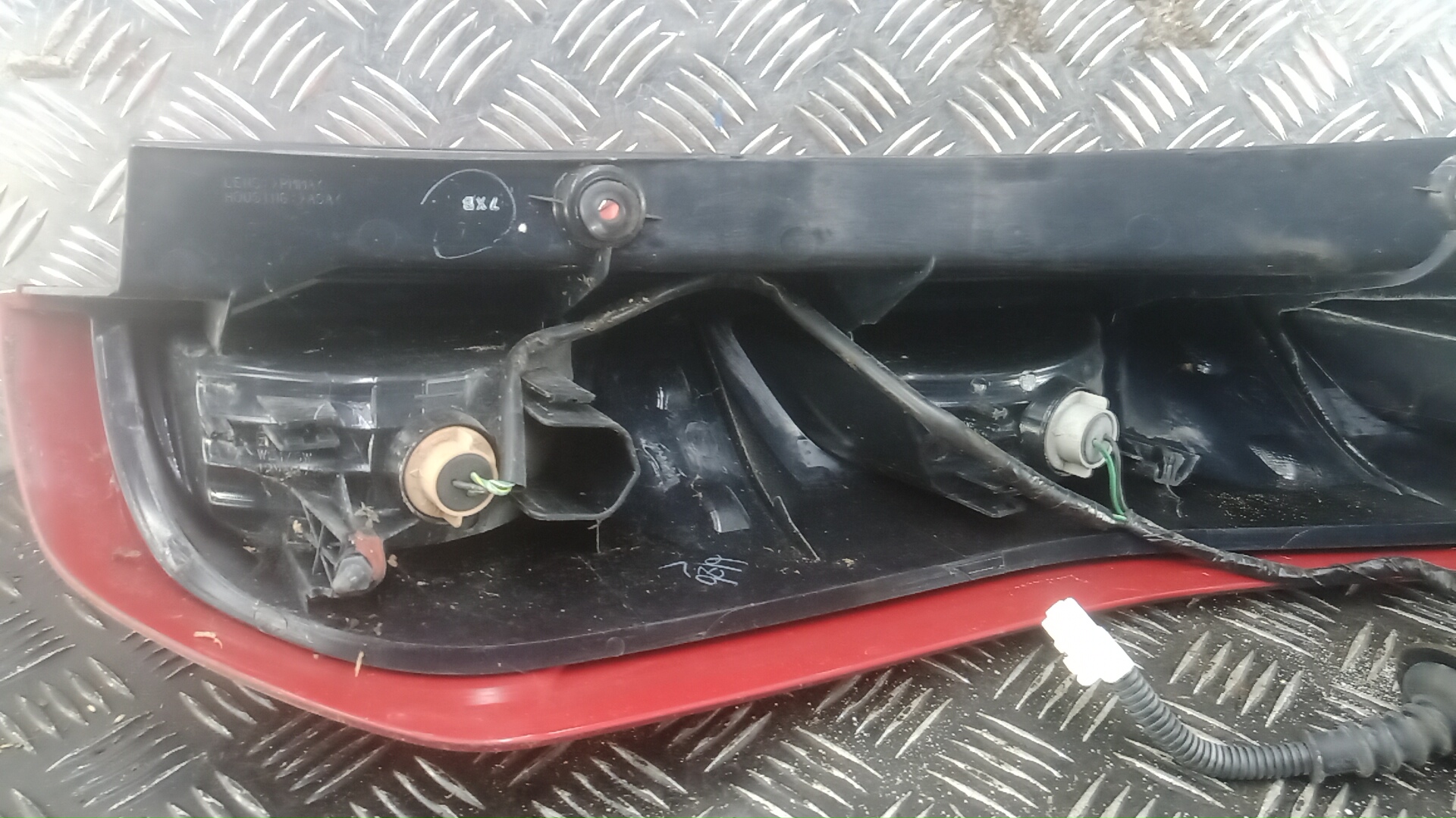 Фонарь задний левый