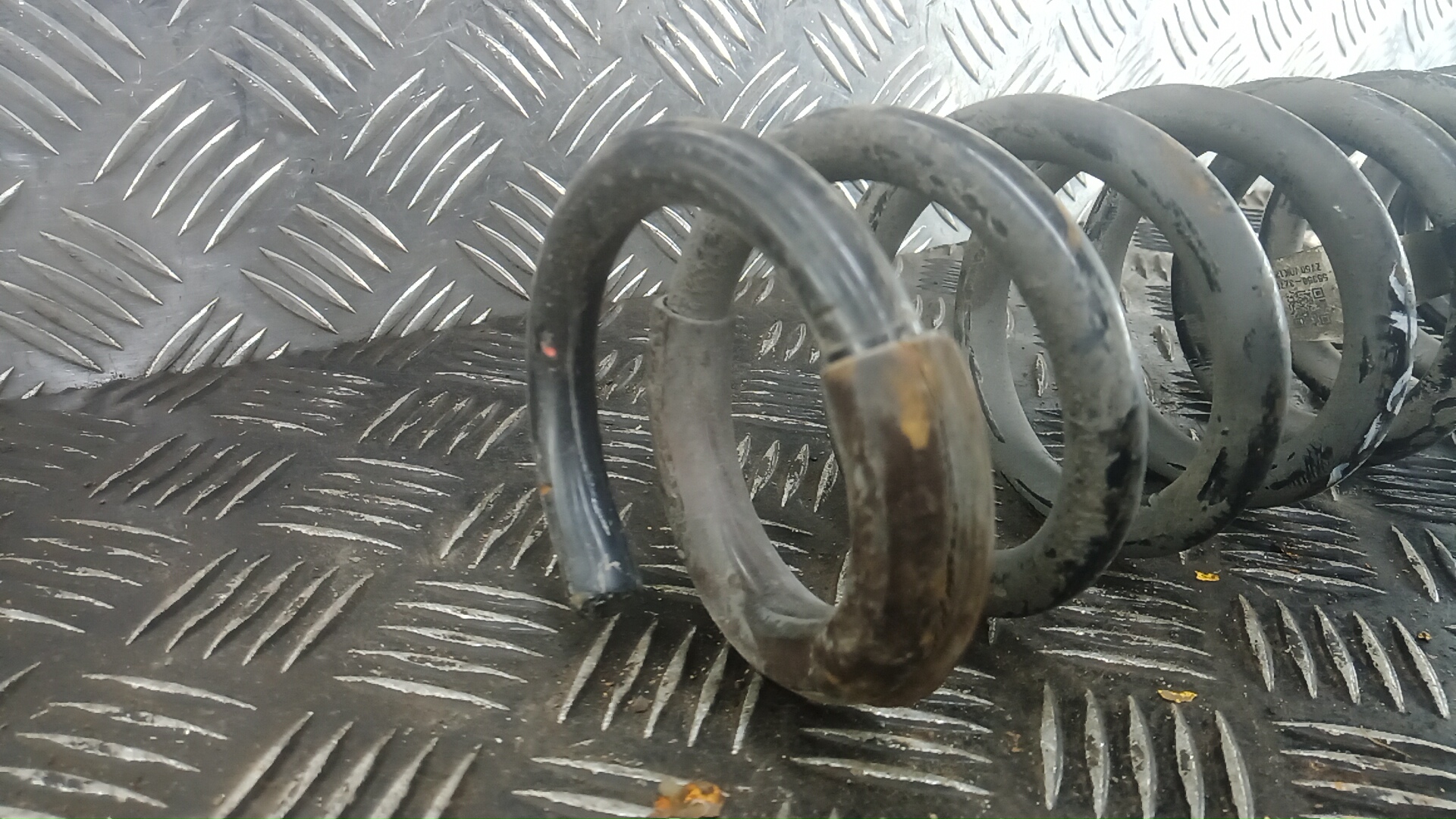 Пружина задняя