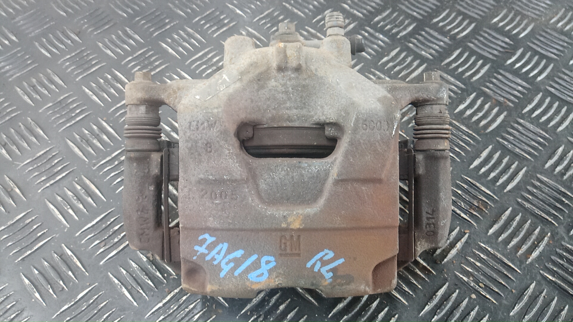 Суппорт передний левый