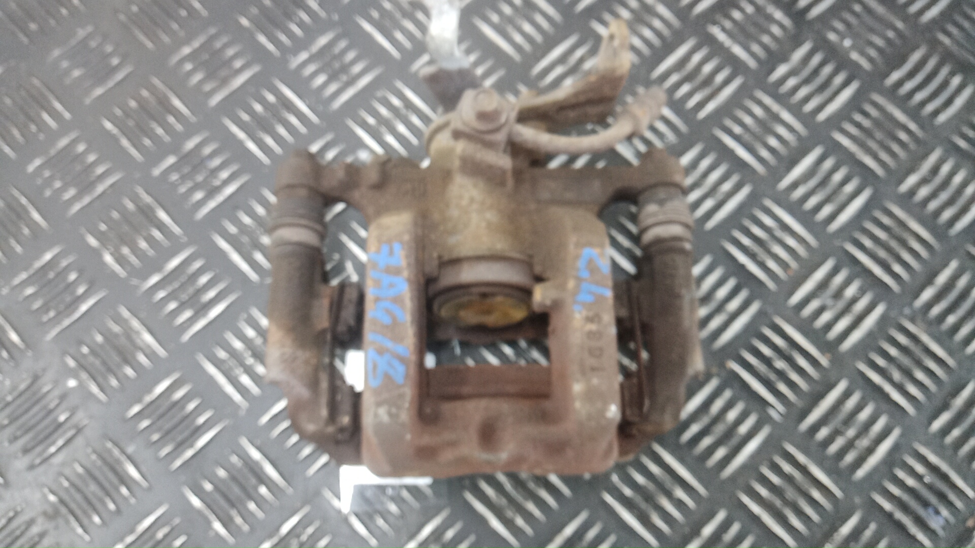 Суппорт задний левый