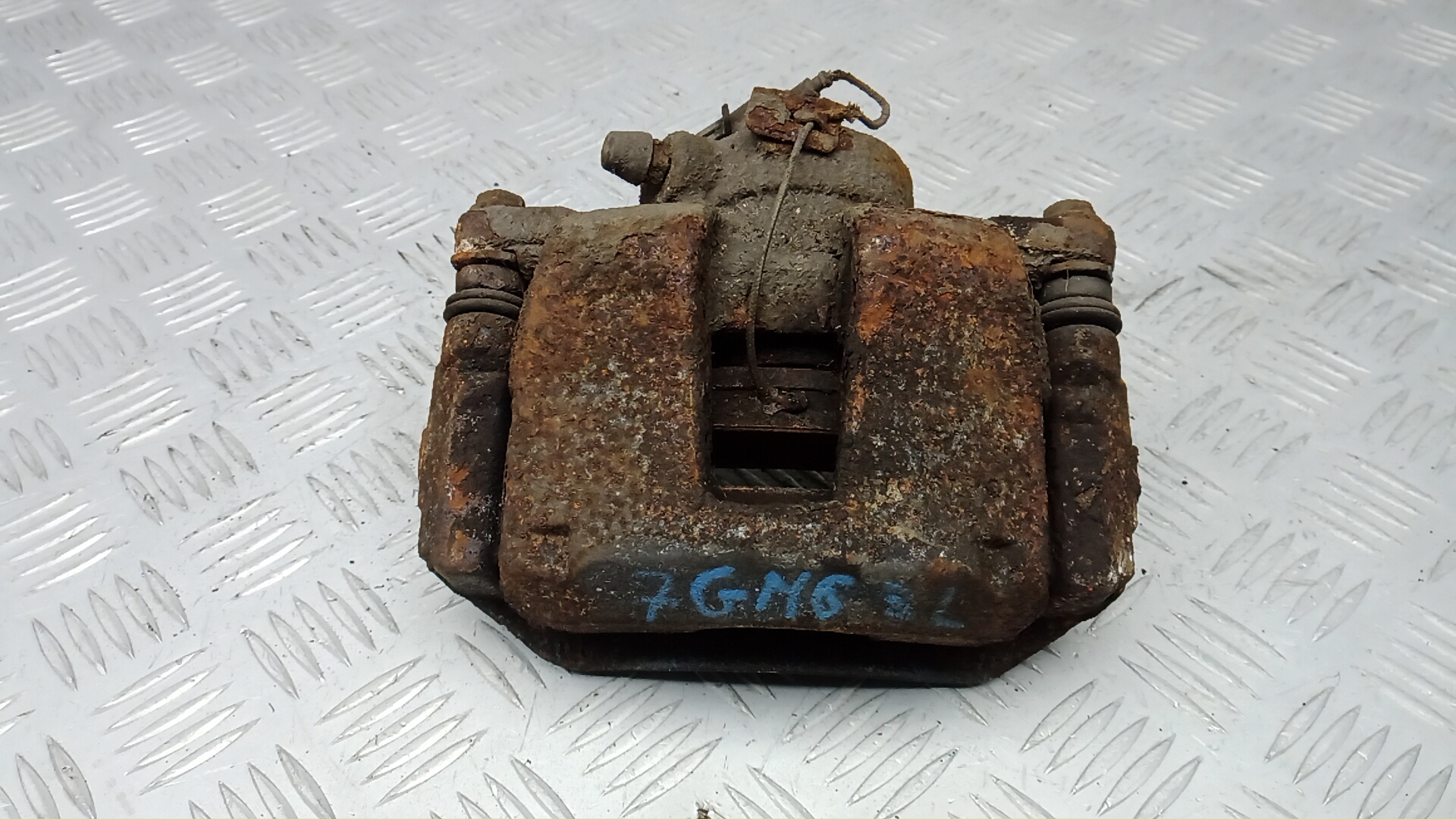 Суппорт задний левый