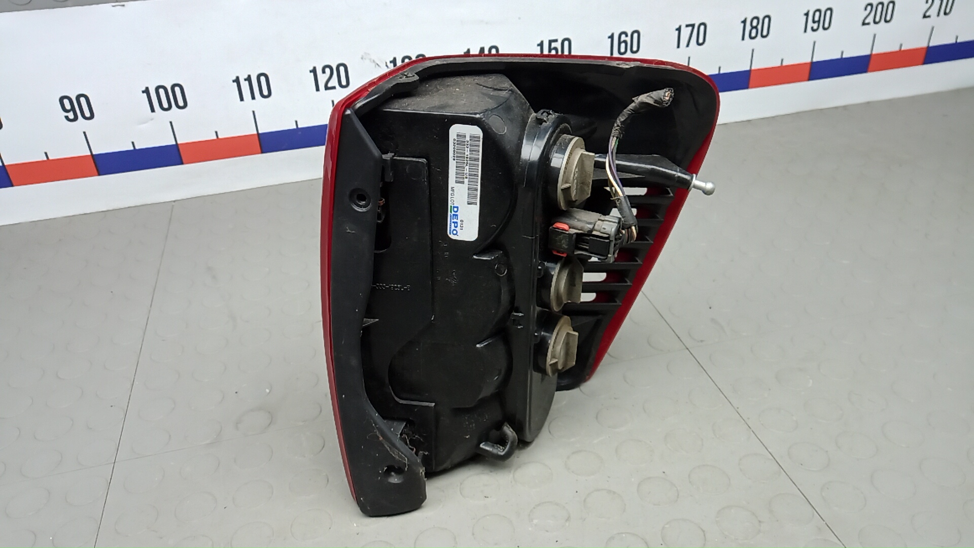 Фонарь задний левый