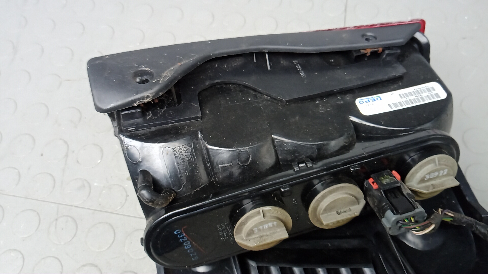 Фонарь задний левый