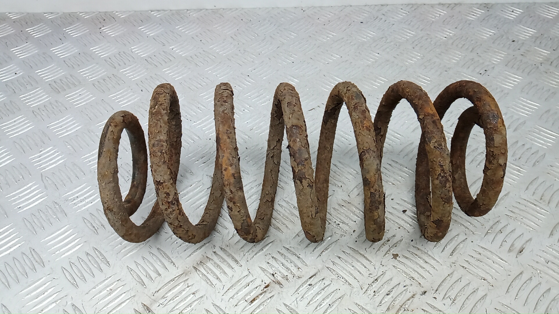 Пружина передняя