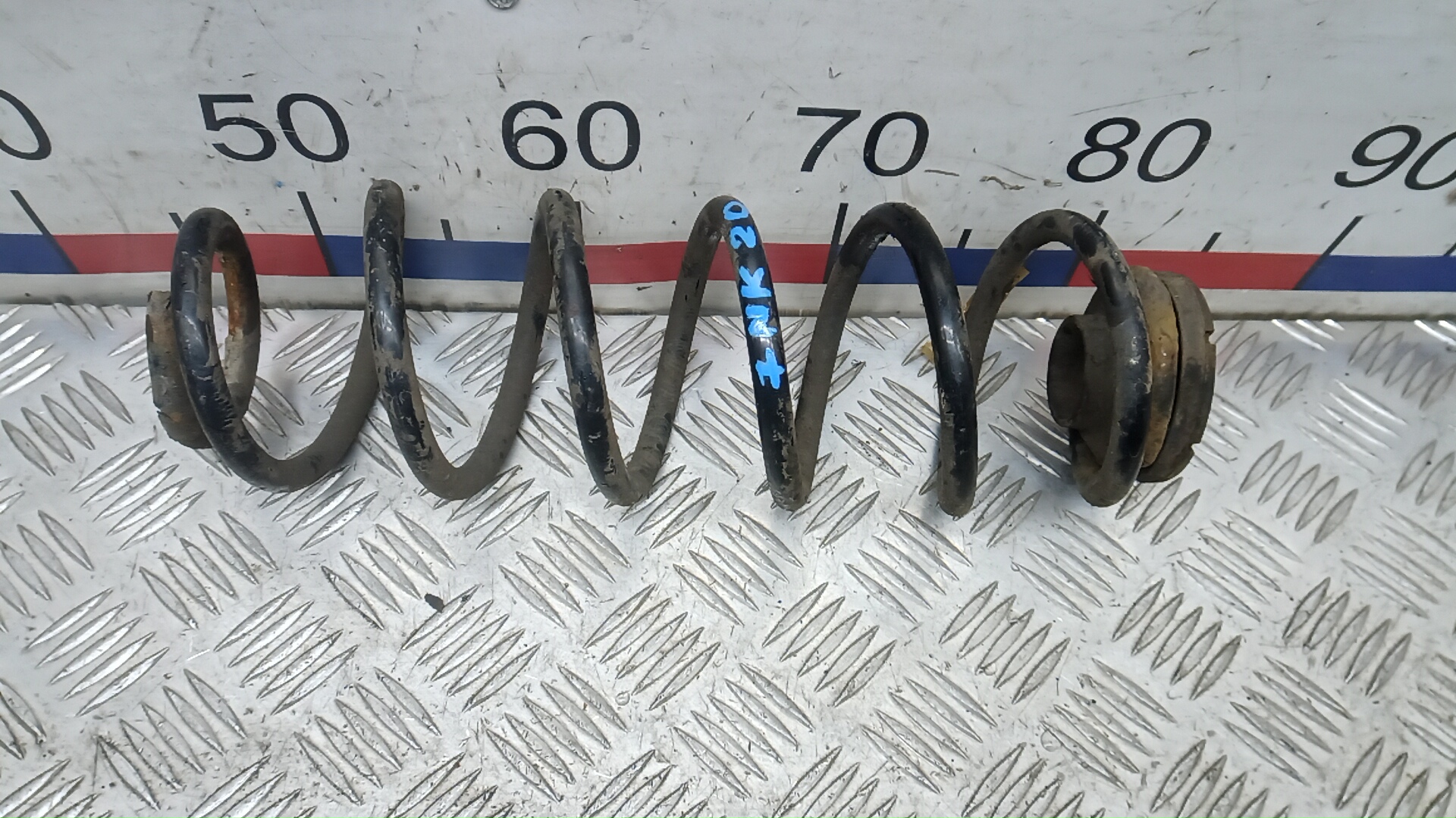 Пружина задняя