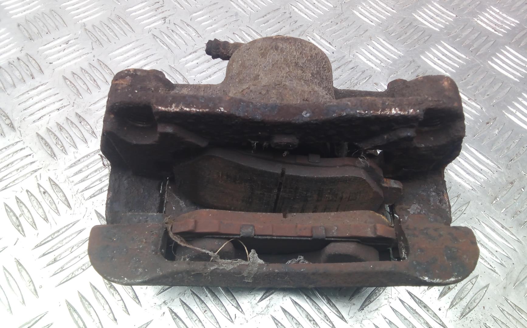 Суппорт передний левый